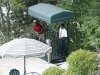 2 people covered umbrella